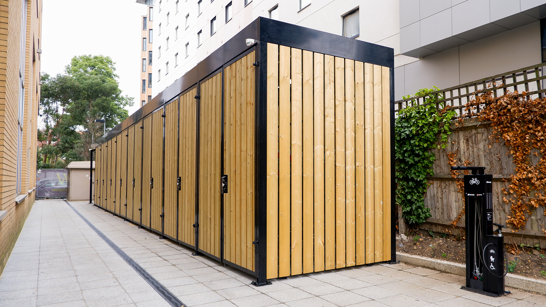 compact timber cubic bike store ealing