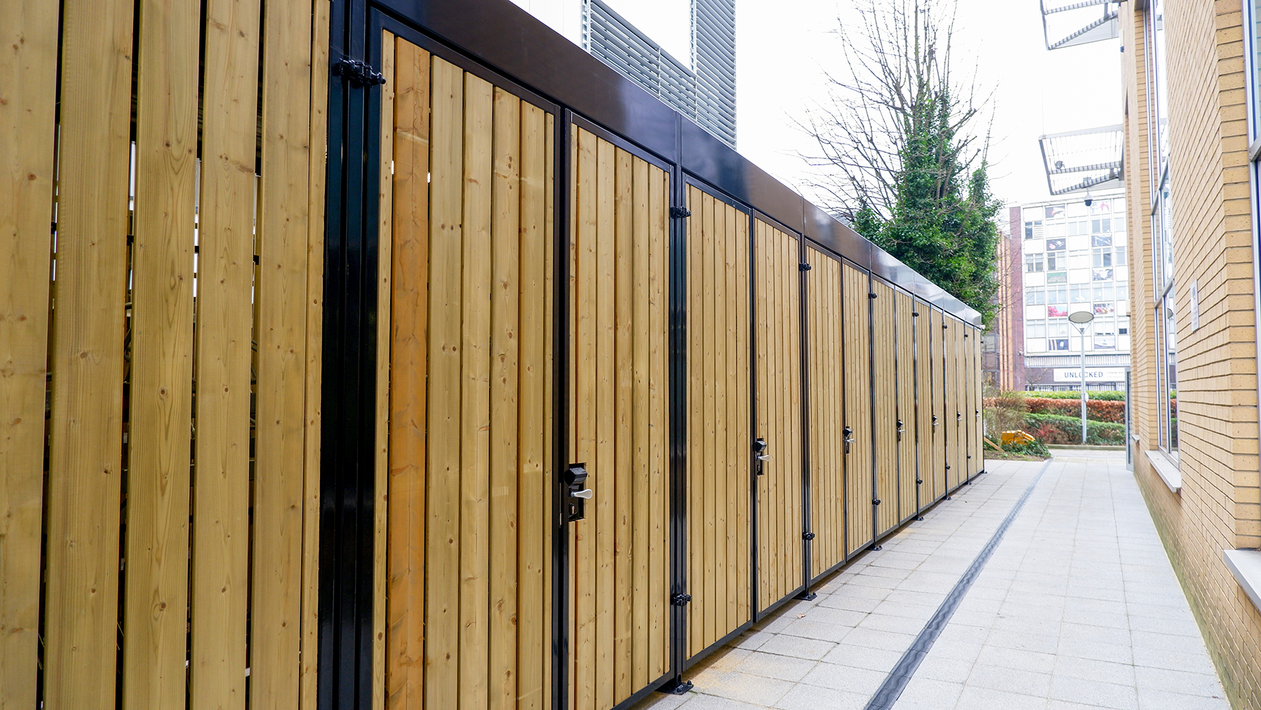 compact timber cubic bike store ealing