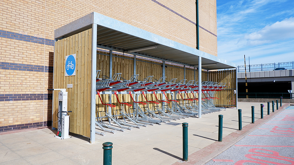 open fronted timber bike shelter