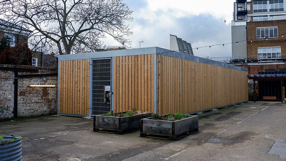 turvec timber cubic cycle shelter