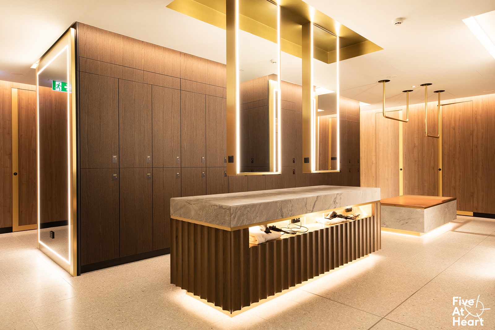 sinks and mirror with changing lockers for end of trip facility in australia